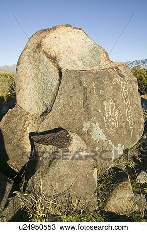 Stock Image - Three Rivers Petroglyph National Site, a (BLM) Bureau of Land Management Site, features more than 21, 000 Native American Indian petroglyphs and examples of prehistoric Jornada Mogollon rock art, off Route 54, South of Carrizozo, New Mexico. Fotosearch