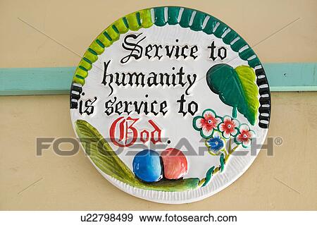 A ceramic plate says "Service to Humanity is Service to God" in Meru, Kenya, Africa View Large Photo Image Stock Photo - A ceramic plate says "Service to Humanity is Service to God" in Meru, Kenya, Africa. Fotosearch