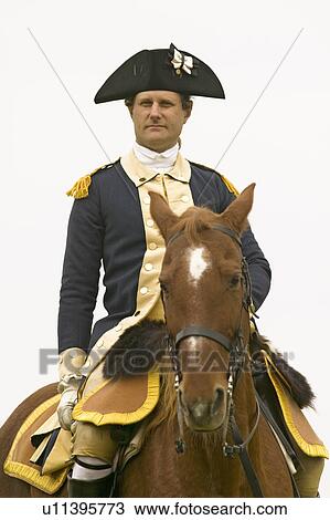 Stock Image - A closeup of General George Washington at the 225th Anniversary of the Victory at Yorktown, a reenactment of the siege of Yorktown, where General George Washington commanded 17, 600 American troops and French Comte de Rochambeau lead 5500 French troops, to. Fotosearch