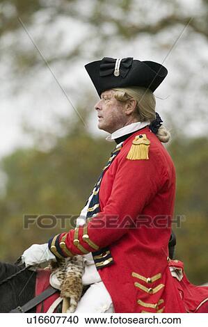 Stock Image - A profile closeup of General Charles O'Hara surrenders to General George Washington at the 225th Anniversary of the Victory at Yorktown, a reenactment of the siege of Yorktown, where General George Washington commanded 17, 600 American troops and French Co. Fotosearch