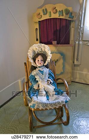 Stock Image - Antique dolls of Casa Mila by Antoni Gaudi, built between 1905-1911, Barcelona, Spain. Fotosearch