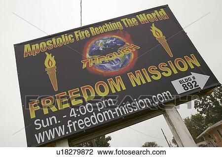 Stock Image - Apostolic Fire road sign promotes Christian right wing beliefs on Route 44 in Crawford County, Missouri. Fotosearch