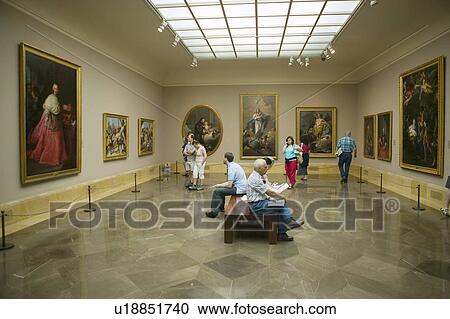 Stock Image - Art appreciators view paintings in Museum de Prado, Prado Museum, Madrid, Spain. Fotosearch