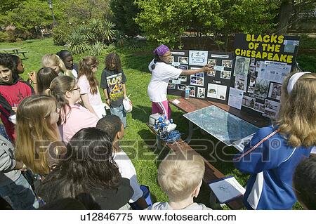 Black student teaches about African Americans in Chesapeake Bay, Earth Day Event in Alexandria, Virginia View Large Photo Image Stock Photography - Black student teaches about African Americans in Chesapeake Bay, Earth Day Event in Alexandria, Virginia. Fotosearch