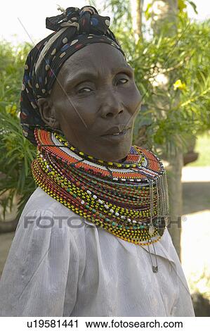 Stock Image - Black woman at the Pepo La Tumaini Jangwani, HIV/AIDS Community Rehabilitation Program, Orphanage & Clinic. Pepo La Tumaini Jangwani (wind of hope in the arid place) offers hope, support and care for orphan and vulnerable children living with HIV/AIDS in. Fotosearch