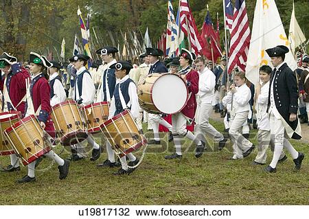 Stock Image - British fife and drum marches on Surrender Road at the 225th Anniversary of the Victory at Yorktown, a reenactment of the siege of Yorktown, where General George Washington commanded 17, 600 American troops and French Comte de Rochambeau lead 5500 French t. Fotosearch
