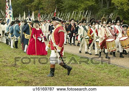 Stock Photo - British fife and drum marches on Surrender Road at the 225th Anniversary of the Victory at Yorktown, a reenactment of the siege of Yorktown, where General George Washington commanded 17, 600 American troops and French Comte de Rochambeau lead 5500 French t. Fotosearch