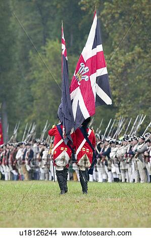 British flag and British troops at Surrender Field at the 225th Anniversary of the Victory at Yorktown, a reenactment of the siege of Yorktown, where General George Washington commanded 17, 600 American troops and French Comte de Rochambeau lead 5500 Frenc View Large Photo Image Picture - British flag and British troops at Surrender Field at the 225th Anniversary of the Victory at Yorktown, a reenactment of the siege of Yorktown, where General George Washington commanded 17, 600 American troops and French Comte de Rochambeau lead 5500 Frenc. Fotosearch