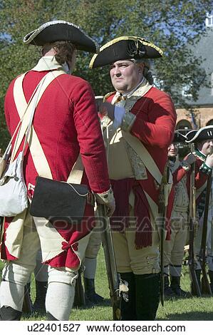 British soldiers toast to the King of England in front of the Digges House, built in 1775 in Yorktown, Virginia. First owner Dudley Digges' house now resides in the Colonial National Historical Park, Historical Triangle, as part of the 225th anniversary o View Large Photo Image Stock Photo - British soldiers toast to the King of England in front of the Digges House, built in 1775 in Yorktown, Virginia. First owner Dudley Digges' house now resides in the Colonial National Historical Park, Historical Triangle, as part of the 225th anniversary o. Fotosearch