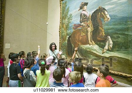Stock Image - Children learn about paintings in Museum de Prado, Prado Museum, Madrid, Spain. Fotosearch