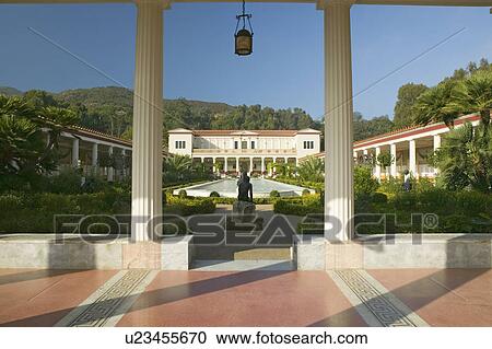 Colonnade and long pool of the Getty Villa, Malibu Villa of the J. Paul Getty Museum in Los Angeles, California View Large Photo Image Stock Image - Colonnade and long pool of the Getty Villa, Malibu Villa of the J. Paul Getty Museum in Los Angeles, California. Fotosearch