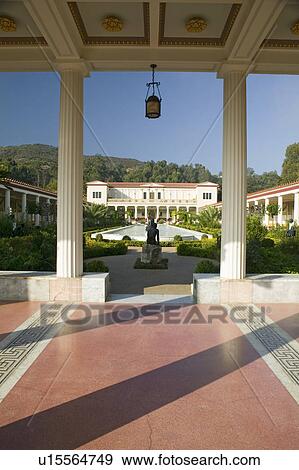 Stock Photo - Colonnade and long pool of the Getty Villa, Malibu Villa of the J. Paul Getty Museum in Los Angeles, California. Fotosearch