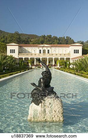 Colonnade and long pool of the Getty Villa, Malibu Villa of the J. Paul Getty Museum in Los Angeles, California View Large Photo Image Stock Photo - Colonnade and long pool of the Getty Villa, Malibu Villa of the J. Paul Getty Museum in Los Angeles, California. Fotosearch