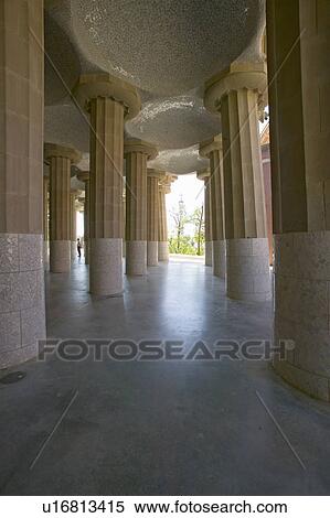 Stock Photography - Columns supporting tiled ceiling of Antoni Gaudi's Parc Guell, Barcelona, Spain. Fotosearch