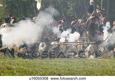 Stock Photo - Continental Light Infantry and attached units defend Redoubt No. 10 from British counter attack in re-enactment of Attack on Redoubts 9 & 10, where the major infantry action of the siege of Yorktown took place. General Washington's armies captured two Br. Fotosearch