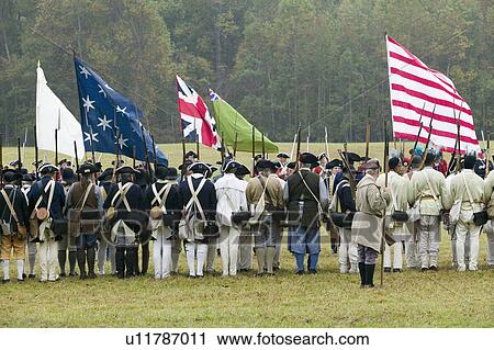 Stock Image - Continentals arrive at the 225th Anniversary of the Victory at Yorktown, a reenactment of the siege of Yorktown, where General George Washington commanded 17, 600 American troops and French Comte de Rochambeau lead 5500 French troops, together defeating Ge. Fotosearch