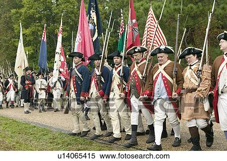 Stock Photography - Continentals arrive at the 225th Anniversary of the Victory at Yorktown, a reenactment of the siege of Yorktown, where General George Washington commanded 17, 600 American troops and French Comte de Rochambeau lead 5500 French troops, together defeating Ge. Fotosearch
