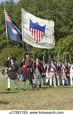 Continentals on the march with early American Flags in re-enactment of Attack on Redoubts 9 & 10, where the major infantry action of the siege of Yorktown took place. General Washington's armies captured two British fortifications, Endview Plantation (cir View Large Photo Image Stock Photography - Continentals on the march with early American Flags in re-enactment of Attack on Redoubts 9 & 10, where the major infantry action of the siege of Yorktown took place. General Washington's armies captured two British fortifications, Endview Plantation (cir. Fotosearch