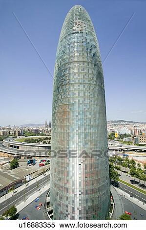 Stock Photography - Day view of phallic-shaped Torre Agbar or Agbar Tower in Barcelona, Spain, designed by Jean Nouvel, September 2005. Fotosearch
