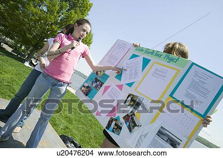 Female student discusses Earth Force environmental Project on Earth Day, Alexandria, Virginia View Large Photo Image Picture - Female student discusses Earth Force environmental Project on Earth Day, Alexandria, Virginia. Fotosearch