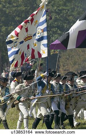 Picture - French storm Redoubt No. 9 in re-enactment of Attack on Redoubts 9 & 10, where the major infantry action of the siege of Yorktown took place. General Washington's armies captured two British fortifications, Endview Plantation (circa 1769), near Yorktown V. Fotosearch