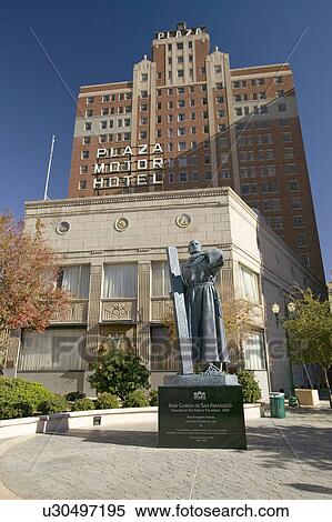 Garcia de San Francisco statue with cross in front of Plaza Motor Hotel in Plaza district of El Paso, Texas View Large Photo Image Stock Photography - Garcia de San Francisco statue with cross in front of Plaza Motor Hotel in Plaza district of El Paso, Texas. Fotosearch
