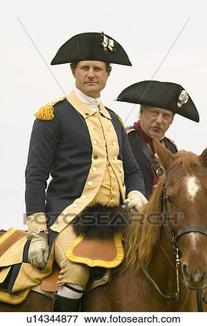 Stock Photo - General George Washington and Major General Benjamin Lincoln confer before march to Surrender Road at the 225th Anniversary of the Victory at Yorktown, a reenactment of the siege of Yorktown, where General George Washington commanded 17, 600 American troop. Fotosearch