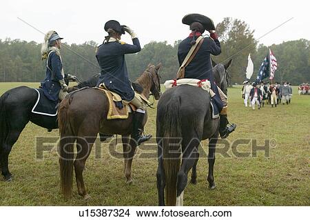 General George Washington and staff prepare to salute column of Continental Patriot troops at Surrender Field at the 225th Anniversary of the Victory at Yorktown, a reenactment of the siege of Yorktown, where General George Washington commanded 17, 600 Ame View Large Photo Image Picture - General George Washington and staff prepare to salute column of Continental Patriot troops at Surrender Field at the 225th Anniversary of the Victory at Yorktown, a reenactment of the siege of Yorktown, where General George Washington commanded 17, 600 Ame. Fotosearch