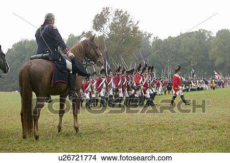 General George Washington salutes British column as they pass at the 225th Anniversary of the Victory at Yorktown, a reenactment of the siege of Yorktown, where General George Washington commanded 17, 600 American troops and French Comte de Rochambeau lead View Large Photo Image Picture - General George Washington salutes British column as they pass at the 225th Anniversary of the Victory at Yorktown, a reenactment of the siege of Yorktown, where General George Washington commanded 17, 600 American troops and French Comte de Rochambeau lead. Fotosearch