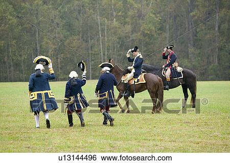 General Washington and aid salute the French staff including Comte De Grasse and General Rochambeau at the 225th Anniversary of the Victory at Yorktown, a reenactment of the siege of Yorktown, where General George Washington commanded 17, 600 American troo View Large Photo Image Stock Photograph - General Washington and aid salute the French staff including Comte De Grasse and General Rochambeau at the 225th Anniversary of the Victory at Yorktown, a reenactment of the siege of Yorktown, where General George Washington commanded 17, 600 American troo. Fotosearch