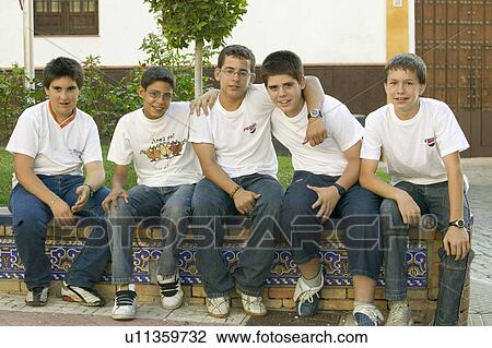 Group of smiling boys in village of Southern Spain off highway A49 west of Sevilla View Large Photo Image Stock Image - Group of smiling boys in village of Southern Spain off highway A49 west of Sevilla. Fotosearch