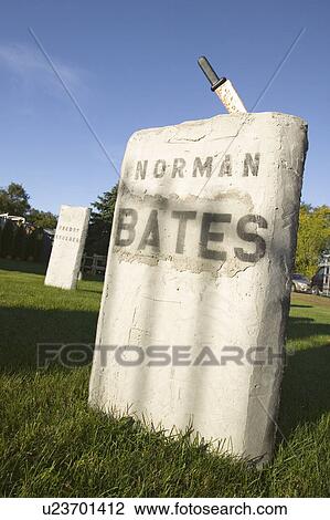 Halloween knife is stuck in grave of "Norman Bates" from the Alfred Hitchcock film, "Psycho, " Newport, Rhode Island View Large Photo Image Stock Image - Halloween knife is stuck in grave of "Norman Bates" from the Alfred Hitchcock film, "Psycho, " Newport, Rhode Island. Fotosearch