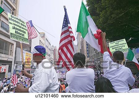 Hundreds of thousands of immigrants participate in march for Immigrants and Mexicans protesting against Illegal Immigration reform by U. S. Congress, Los Angeles, CA, May 1, 2006 View Large Photo Image Stock Image - Hundreds of thousands of immigrants participate in march for Immigrants and Mexicans protesting against Illegal Immigration reform by U. S. Congress, Los Angeles, CA, May 1, 2006. Fotosearch