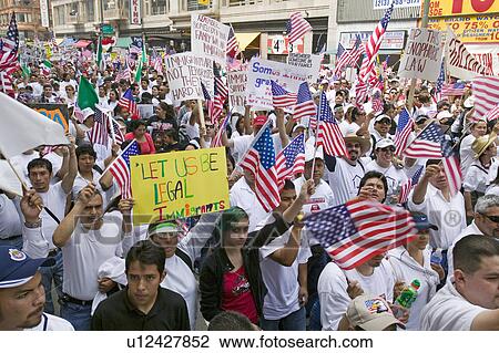 Hundreds of thousands of immigrants participate in march for Immigrants and Mexicans protesting against Illegal Immigration reform by U. S. Congress, Los Angeles, CA, May 1, 2006 View Large Photo Image Stock Image - Hundreds of thousands of immigrants participate in march for Immigrants and Mexicans protesting against Illegal Immigration reform by U. S. Congress, Los Angeles, CA, May 1, 2006. Fotosearch