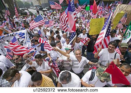 Hundreds of thousands of immigrants participate in march for Immigrants and Mexicans protesting against Illegal Immigration reform by U. S. Congress, Los Angeles, CA, May 1, 2006 View Large Photo Image Stock Image - Hundreds of thousands of immigrants participate in march for Immigrants and Mexicans protesting against Illegal Immigration reform by U. S. Congress, Los Angeles, CA, May 1, 2006. Fotosearch