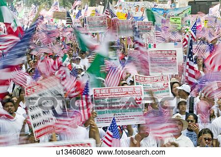 Hundreds of thousands of immigrants participate in march for Immigrants and Mexicans protesting against Illegal Immigration reform by U. S. Congress, Los Angeles, CA, May 1, 2006 View Large Photo Image Stock Image - Hundreds of thousands of immigrants participate in march for Immigrants and Mexicans protesting against Illegal Immigration reform by U. S. Congress, Los Angeles, CA, May 1, 2006. Fotosearch