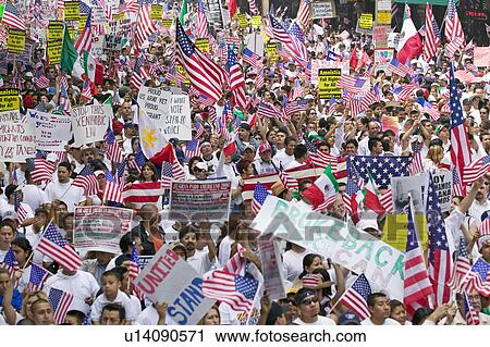 Hundreds of thousands of immigrants participate in march for Immigrants and Mexicans protesting against Illegal Immigration reform by U. S. Congress, Los Angeles, CA, May 1, 2006 View Large Photo Image Stock Image - Hundreds of thousands of immigrants participate in march for Immigrants and Mexicans protesting against Illegal Immigration reform by U. S. Congress, Los Angeles, CA, May 1, 2006. Fotosearch