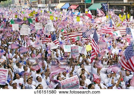 Hundreds of thousands of immigrants participate in march for Immigrants and Mexicans protesting against Illegal Immigration reform by U. S. Congress, Los Angeles, CA, May 1, 2006 View Large Photo Image Stock Image - Hundreds of thousands of immigrants participate in march for Immigrants and Mexicans protesting against Illegal Immigration reform by U. S. Congress, Los Angeles, CA, May 1, 2006. Fotosearch