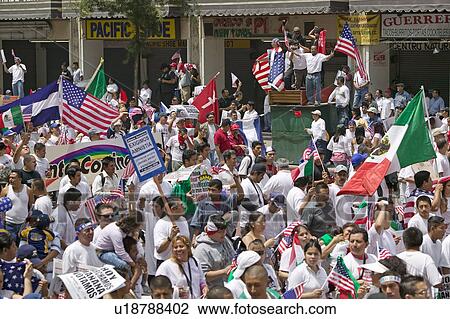 Stock Image - Hundreds of thousands of immigrants participate in march for Immigrants and Mexicans protesting against Illegal Immigration reform by U. S. Congress, Los Angeles, CA, May 1, 2006. Fotosearch