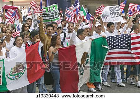 Stock Image - Hundreds of thousands of immigrants participate in march for Immigrants and Mexicans protesting against Illegal Immigration reform by U. S. Congress, Los Angeles, CA, May 1, 2006. Fotosearch