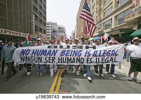 Stock Image - Hundreds of thousands of immigrants participate in march for Immigrants and Mexicans protesting against Illegal Immigration reform by U. S. Congress, Los Angeles, CA, May 1, 2006. Fotosearch