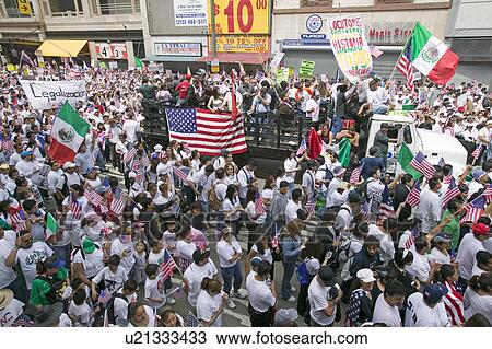 Stock Image - Hundreds of thousands of immigrants participate in march for Immigrants and Mexicans protesting against Illegal Immigration reform by U. S. Congress, Los Angeles, CA, May 1, 2006. Fotosearch