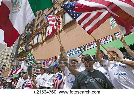 Stock Image - Hundreds of thousands of immigrants participate in march for Immigrants and Mexicans protesting against Illegal Immigration reform by U. S. Congress, Los Angeles, CA, May 1, 2006. Fotosearch