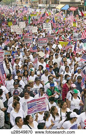 Stock Image - Hundreds of thousands of immigrants participate in march for Immigrants and Mexicans protesting against Illegal Immigration reform by U. S. Congress, Los Angeles, CA, May 1, 2006. Fotosearch