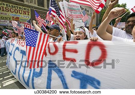Hundreds of thousands of immigrants participate in march for Immigrants and Mexicans protesting against Illegal Immigration reform by U. S. Congress, Los Angeles, CA, May 1, 2006 View Large Photo Image Stock Image - Hundreds of thousands of immigrants participate in march for Immigrants and Mexicans protesting against Illegal Immigration reform by U. S. Congress, Los Angeles, CA, May 1, 2006. Fotosearch