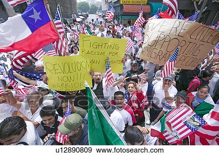Stock Photo - Hundreds of thousands of immigrants participate in march for Immigrants and Mexicans protesting against Illegal Immigration reform by U. S. Congress, Los Angeles, CA, May 1, 2006. Fotosearch