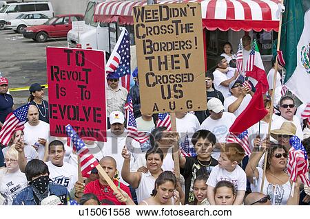 Stock Photo - Hundreds of thousands of immigrants participate in march for Immigrants and Mexicans protesting against Illegal Immigration reform by U. S. Congress, Los Angeles, CA, May 1, 2006. Fotosearch