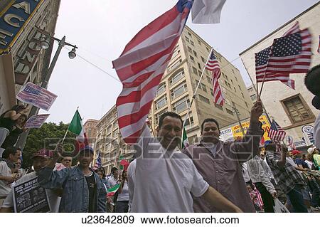 Hundreds of thousands of immigrants participate in march for Immigrants and Mexicans protesting against Illegal Immigration reform by U. S. Congress, Los Angeles, CA, May 1, 2006 View Large Photo Image Stock Photo - Hundreds of thousands of immigrants participate in march for Immigrants and Mexicans protesting against Illegal Immigration reform by U. S. Congress, Los Angeles, CA, May 1, 2006. Fotosearch