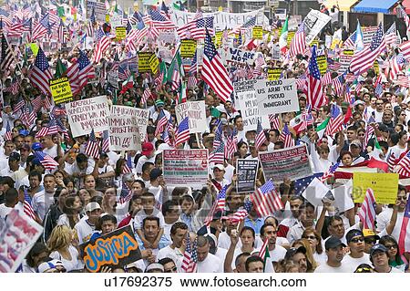 Hundreds of thousands of immigrants participate in march for Immigrants and Mexicans protesting against Illegal Immigration reform by U. S. Congress, Los Angeles, CA, May 1, 2006 View Large Photo Image Stock Photography - Hundreds of thousands of immigrants participate in march for Immigrants and Mexicans protesting against Illegal Immigration reform by U. S. Congress, Los Angeles, CA, May 1, 2006. Fotosearch
