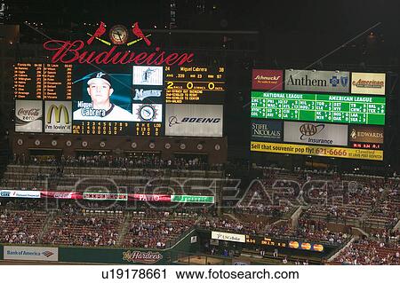In a night game and a light rain mist, a scoreboard is seen at the 3rd Busch Stadium, St. Louis, Missouri on August 29, 2006 View Large Photo Image Stock Image - In a night game and a light rain mist, a scoreboard is seen at the 3rd Busch Stadium, St. Louis, Missouri on August 29, 2006. Fotosearch